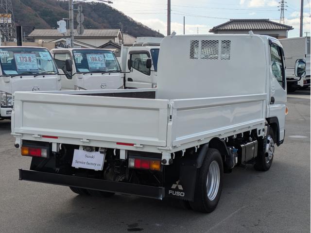 キャンター 全低床　積載２ｔ　ＡＴ　荷台内寸　長さ：３１１ｃｍ　幅：１６１ｃｍ　高さ：３８ｃｍ　助手席側電動格納ミラー　ＥＴＣ　フォグランプ　カーナビ　バックカメラ　パワーウインドウ　パワーステアリング　エアコン（8枚目）