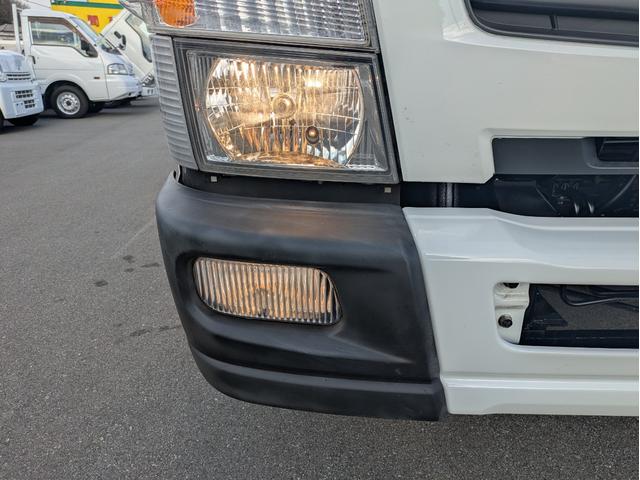 キャンター ロング　積載４．６５ｔ　荷台内寸　長さ：４３５ｃｍ　幅：２０９ｃｍ　高さ：３８ｃｍ　キーレスリモコン　バックカメラ　ＥＴＣ　パワーステアリング　パワーウインドウ　セイコーラック　助手席側電動格納ミラー（27枚目）