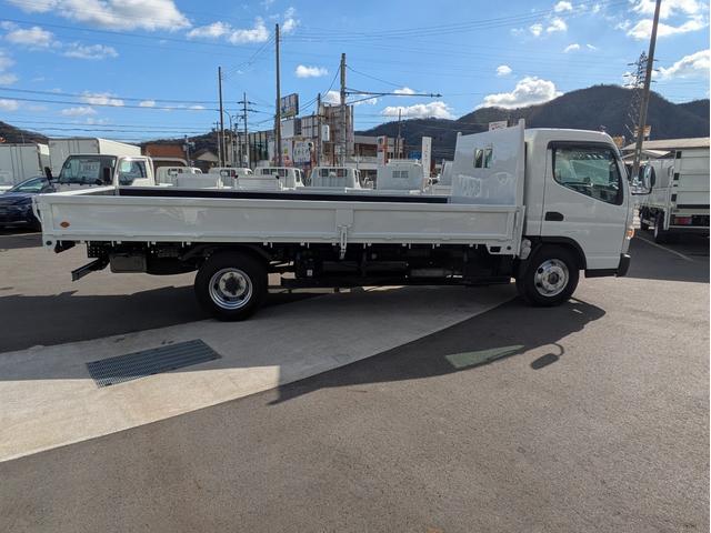 キャンター 　積載３．５ｔ　５ＭＴ　荷台内寸　長さ：５００ｃｍ　幅：２０９ｃ　高さ：３８ｃｍ　車両総重量：６，９２５ｋｇ　ＥＴＣ　セイコーラック　パワーウインドウ　パワーステアリング　助手席側電動格納ミラー（6枚目）