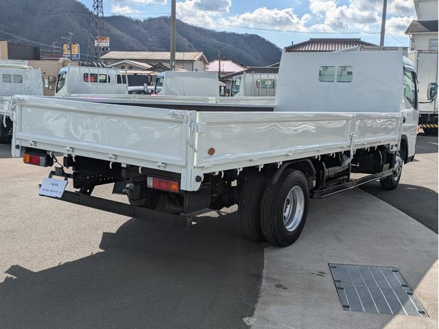 キャンター 　積載３．５ｔ　５ＭＴ　荷台内寸　長さ：５００ｃｍ　幅：２０９ｃ　高さ：３８ｃｍ　車両総重量：６，９２５ｋｇ　ＥＴＣ　セイコーラック　パワーウインドウ　パワーステアリング　助手席側電動格納ミラー（9枚目）