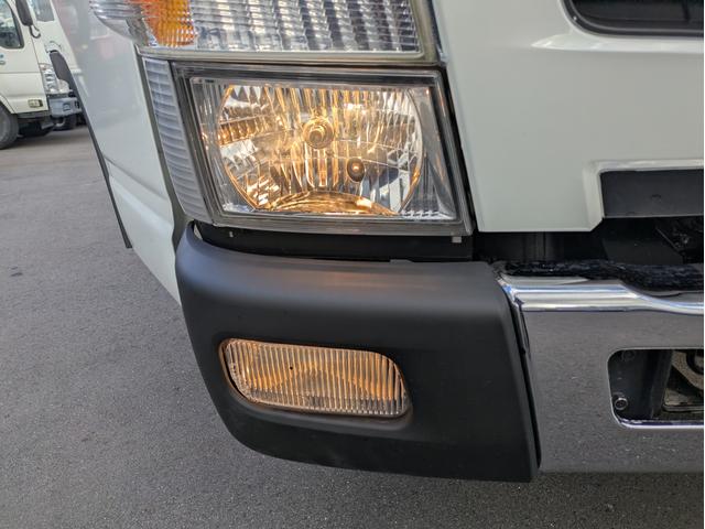 キャンター 　積載３．５ｔ　５ＭＴ　荷台内寸　長さ：５００ｃｍ　幅：２０９ｃ　高さ：３８ｃｍ　車両総重量：６，９２５ｋｇ　ＥＴＣ　セイコーラック　パワーウインドウ　パワーステアリング　助手席側電動格納ミラー（46枚目）