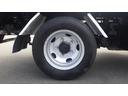 全低床ダンプ　積載３ｔ　５ＭＴ車両総重量　６，０４５ｋｇ　荷台内寸　長さ：３０５ｃｍ　幅：１６０ｃｍ　高さ：３７ｃｍ　コボレーン　中間ピン　ＥＳスタート（坂道発進補助装置）　アイドリングストップ　ＥＴＣ（32枚目）