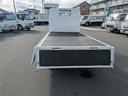 全低床　積載２ｔ　ＡＴ　荷台内寸　長さ：３１１ｃｍ　幅：１６１ｃｍ　高さ：３８ｃｍ　助手席側電動格納ミラー　ＥＴＣ　フォグランプ　カーナビ　バックカメラ　パワーウインドウ　パワーステアリング　エアコン（64枚目）