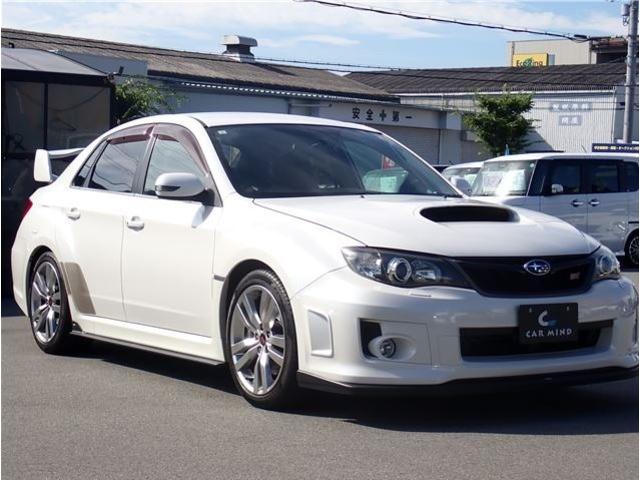 インプレッサ ＷＲＸ　ＳＴＩ　Ａライン　後期型　アプライドモデルＤ型　社外フルセグナビ　ＥＴＣ　Ｂカメラ　ＳＴＩパーツ（大型リアウイング　大型ブレーキキャリパー　エアロパーツ　タワーバー　１８アルミ　４本出しマフラー　ハーフレザーシート）（7枚目）