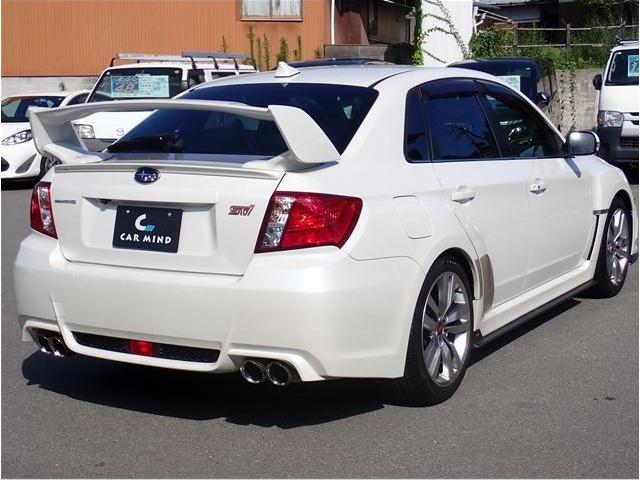 インプレッサ ＷＲＸ　ＳＴＩ　Ａライン　後期型　アプライドモデルＤ型　社外フルセグナビ　ＥＴＣ　Ｂカメラ　ＳＴＩパーツ（大型リアウイング　大型ブレーキキャリパー　エアロパーツ　タワーバー　１８アルミ　４本出しマフラー　ハーフレザーシート）（9枚目）