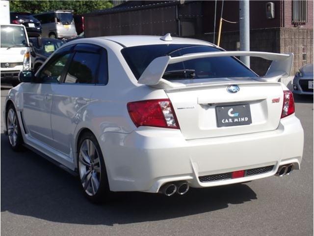 インプレッサ ＷＲＸ　ＳＴＩ　Ａライン　後期型　アプライドモデルＤ型　社外フルセグナビ　ＥＴＣ　Ｂカメラ　ＳＴＩパーツ（大型リアウイング　大型ブレーキキャリパー　エアロパーツ　タワーバー　１８アルミ　４本出しマフラー　ハーフレザーシート）（10枚目）