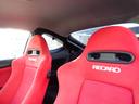 タイプＲ　６速ＭＴ　Ｋ２０Ａエンジンタイミングチェーン　赤内装　純正レカロシート　レーシングギア車高調　ブレンボキャリパーブレーキ　社外マフラー　純正１７インチアルミ　純正エアロ　純正リアウイング（19枚目）
