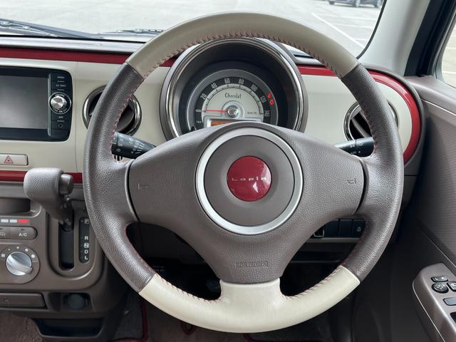 アルトラパンショコラ Ｇ　禁煙車　社外ナビ（ワンセグ／ＡＭ／ＦＭ／ＵＳＢ／ＢＴ）　バックカメラ　純正マット　プッシュスタート　スマートキー　オートライト　アイドリングストップ　革巻きハンドル　バイザー（21枚目）