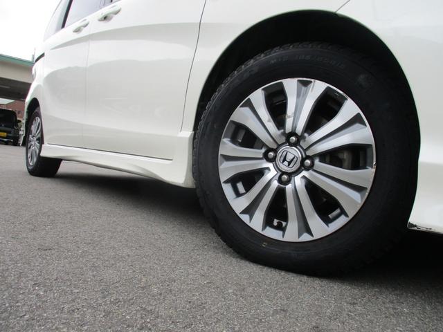 フリードハイブリッド ジャストセレクション　純正９インチメモリーナビ　バックカメラ　ＥＴＣ　ドラレコ　スマートキー　両側パワスラ　クルコン　横滑防止　フロントワイパーデアイサー　ハーフレザーシート　ＨＩＤ　オートライト　純正１５インチアルミ（19枚目）