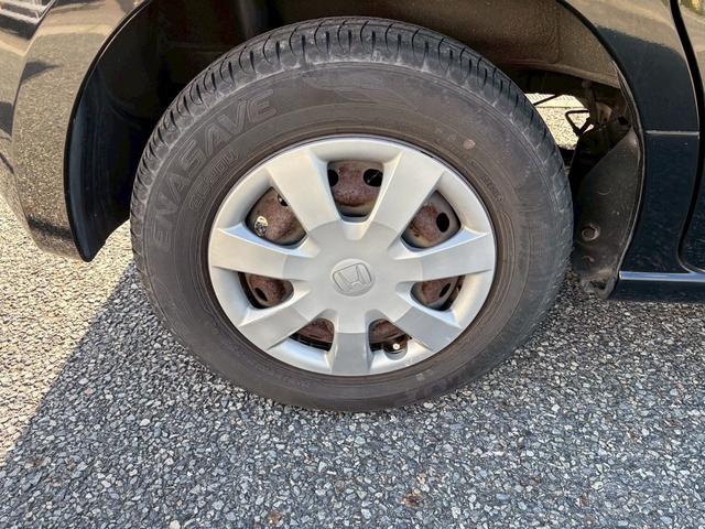 N-BOX G・Lパッケージ 走行距離110000キロ 車検整備 オートエアコン 両側スライドドア 片側電動スライドドア 電動格納ミラー エコモード ETC車載器 横滑り防止装置 ホンダ純正ホイールキャップ(12枚目)