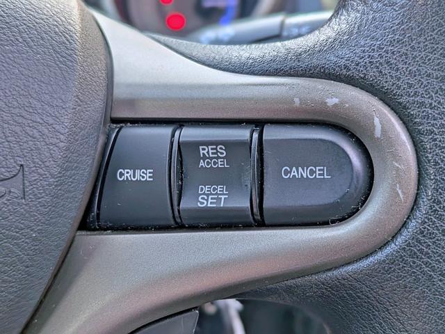 フィットハイブリッド ベースグレード　純正ＣＤ／ＡＵＸ／クルコン／ＥＴＣ／オートＡＣ／禁煙／キーレス／ＥＣＯＮモード／シートリフター／バニティミラー／ウィンカーミラー／チップアップシート（7枚目）