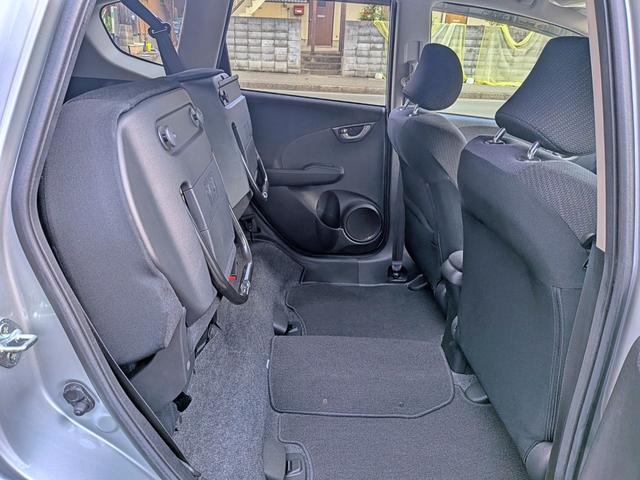 フィットハイブリッド ベースグレード　純正ＣＤ／ＡＵＸ／クルコン／ＥＴＣ／オートＡＣ／禁煙／キーレス／ＥＣＯＮモード／シートリフター／バニティミラー／ウィンカーミラー／チップアップシート（10枚目）