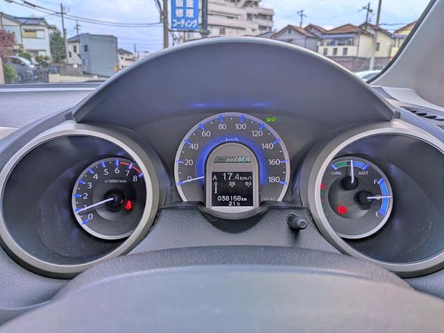 フィットハイブリッド ベースグレード　純正ＣＤ／ＡＵＸ／クルコン／ＥＴＣ／オートＡＣ／禁煙／キーレス／ＥＣＯＮモード／シートリフター／バニティミラー／ウィンカーミラー／チップアップシート（26枚目）