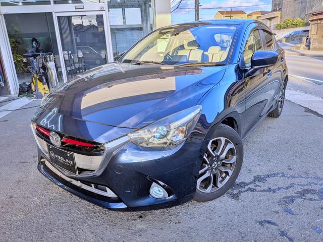 デミオ ＸＤツーリング　Ｌパッケージ　６ＭＴ／衝突軽減／純ナビ／ハーフレザー／ＨＵＤ／ＥＴＣ／クルコン／フルセグ／ＢＴ／オートＡＣ／ＬＥＤヘッド／フォグ／オートライト／ＶＤＣ／アイドリングＳＴＯＰ／純１６ＡＷ／ステリモ／リアスポイラー（20枚目）