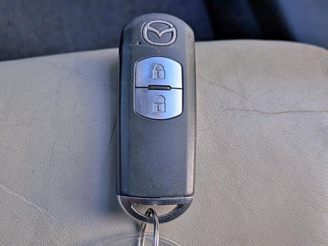 デミオ ＸＤツーリング　Ｌパッケージ　６ＭＴ／衝突軽減／純ナビ／ハーフレザー／ＨＵＤ／ＥＴＣ／クルコン／フルセグ／ＢＴ／オートＡＣ／ＬＥＤヘッド／フォグ／オートライト／ＶＤＣ／アイドリングＳＴＯＰ／純１６ＡＷ／ステリモ／リアスポイラー（40枚目）