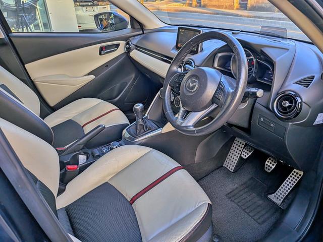 デミオ ＸＤツーリング　Ｌパッケージ　６ＭＴ／衝突軽減／純ナビ／ハーフレザー／ＨＵＤ／ＥＴＣ／クルコン／フルセグ／ＢＴ／オートＡＣ／ＬＥＤヘッド／フォグ／オートライト／ＶＤＣ／アイドリングＳＴＯＰ／純１６ＡＷ／ステリモ／リアスポイラー（41枚目）