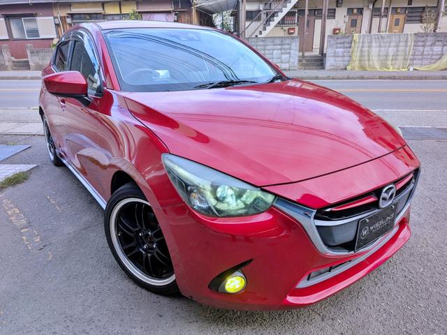 デミオ ＸＤツーリング　６ＭＴ／衝突軽減／純ナビフルセグ／Ｂカメラ／ＢＴ／クルコン／ＲＶＭ／車線逸脱警報／ＤＳＣ／ＨＵＤ／ＥＴＣ／ステリモ／ＬＥＤヘッド／フォグ／オートＡＣ／外１７ＡＷ／ＵＳＢ／ＤＶＤ／ウィンカーミラー（16枚目）