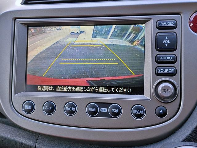 フィットハイブリッド スマートセレクション　純ＨＤＤナビ地デジ／モデューロフルエアロ／ＨＩＤ／ＥＴＣ／Ｂカメラ／ＲＣＡ入力／Ｍサーバ／禁煙／シートカバー／オートＡＣ／クルコン／ステリモ／ウィンカーミラー／シートリフター／ＣＤ／ＤＶＤ／フォグ（7枚目）