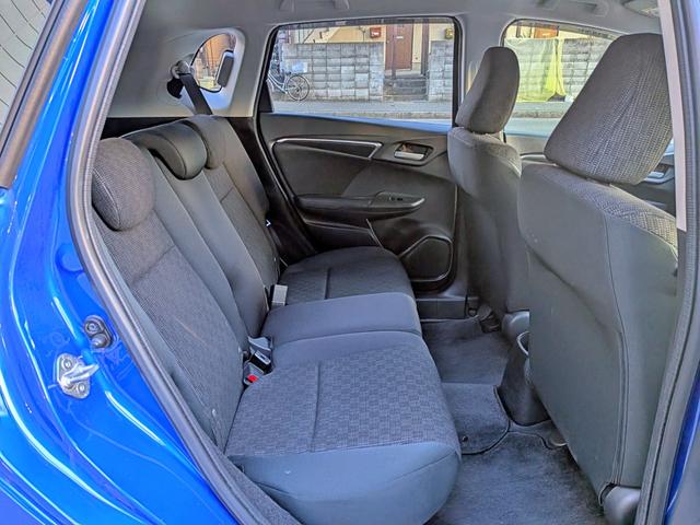 フィット １３Ｇ・Ｆパッケージ　衝突軽減／ナビフルセグ／スマート鍵／禁煙／ＢＴ／アイドリングストップ／ＥＴＣ／ＶＳＡ／ＥＣＯＮモード／チップアップシート／オートＡＣ／バニティミラー／ウィンカーミラー（52枚目）