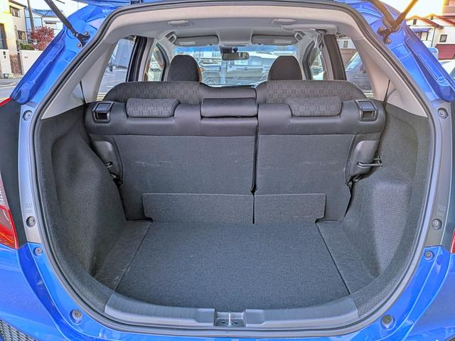 フィット １３Ｇ・Ｆパッケージ　衝突軽減／ナビフルセグ／スマート鍵／禁煙／ＢＴ／アイドリングストップ／ＥＴＣ／ＶＳＡ／ＥＣＯＮモード／チップアップシート／オートＡＣ／バニティミラー／ウィンカーミラー（57枚目）