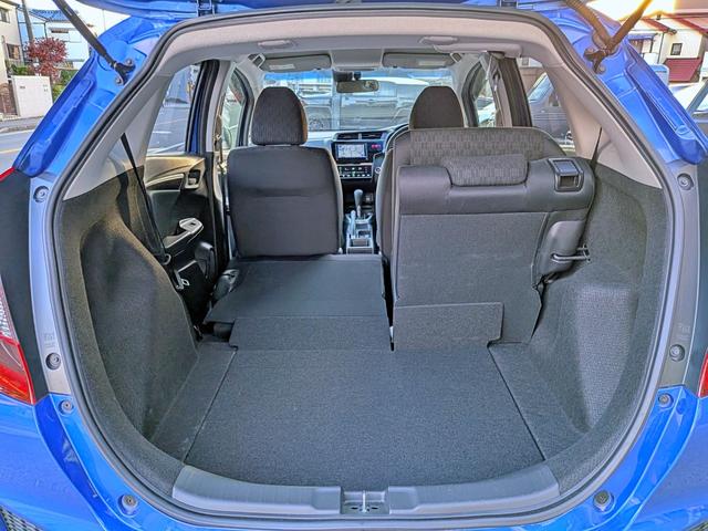 フィット １３Ｇ・Ｆパッケージ　衝突軽減／ナビフルセグ／スマート鍵／禁煙／ＢＴ／アイドリングストップ／ＥＴＣ／ＶＳＡ／ＥＣＯＮモード／チップアップシート／オートＡＣ／バニティミラー／ウィンカーミラー（58枚目）