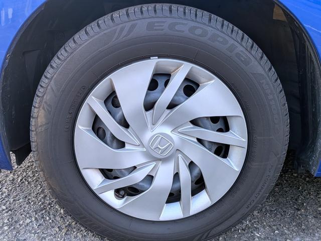 フィット １３Ｇ・Ｆパッケージ　衝突軽減／ナビフルセグ／スマート鍵／禁煙／ＢＴ／アイドリングストップ／ＥＴＣ／ＶＳＡ／ＥＣＯＮモード／チップアップシート／オートＡＣ／バニティミラー／ウィンカーミラー（64枚目）