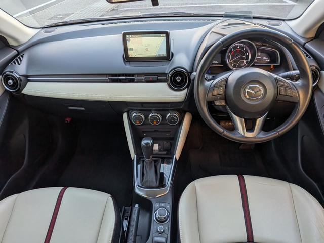 デミオ ＸＤツーリング　Ｌパッケージ　衝突軽減／１オーナー／ナビフルセグ／Ｂカメラ／ＨＵＤ／ＲＶＭ／クルコン／ＢＴ／ＵＳＢ／障害物センサー／ＶＤＣ／車線逸脱警報／パドルシフト／ＬＥＤヘッド／オートＡＣ／純１６ＡＷ／ＥＴＣ／白ハーフレザー（6枚目）