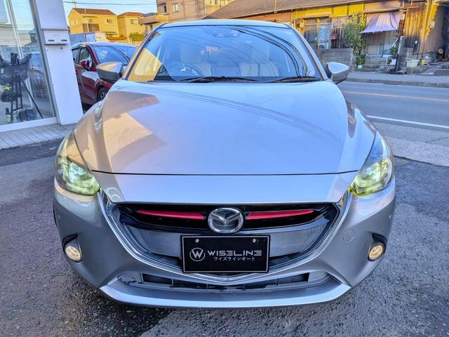 デミオ ＸＤツーリング　Ｌパッケージ　衝突軽減／１オーナー／ナビフルセグ／Ｂカメラ／ＨＵＤ／ＲＶＭ／クルコン／ＢＴ／ＵＳＢ／障害物センサー／ＶＤＣ／車線逸脱警報／パドルシフト／ＬＥＤヘッド／オートＡＣ／純１６ＡＷ／ＥＴＣ／白ハーフレザー（18枚目）