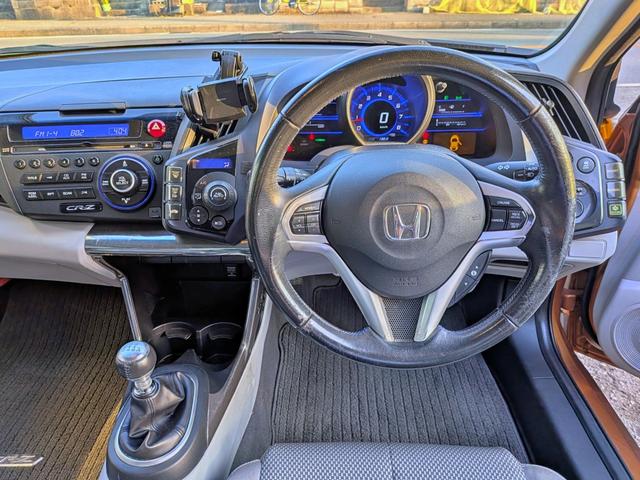 CR-Z α 6MT/ダウンサス/社外マフラー&ウィング/クルコン/スマートキー/ステリモ/HID/フォグ/オートライト/オートAC/CD/AUX/外17AW/外タワーバー/VSA/バニティミラー/ウィンカーミラー(24枚目)