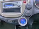 フィットハイブリッド ベースグレード　純正ＣＤ／ＡＵＸ／クルコン／ＥＴＣ／オートＡＣ／禁煙／キーレス／ＥＣＯＮモード／シートリフター／バニティミラー／ウィンカーミラー／チップアップシート（8枚目）