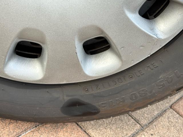 エッセ X X 走行58548キロ 4AT キーレス 電動格納ミラー パワーウィンドウ ドアバイザー 純正CD・FM/AMラジオ AC スペアタイヤ ワンオーナー 禁煙車 記録簿(52枚目)