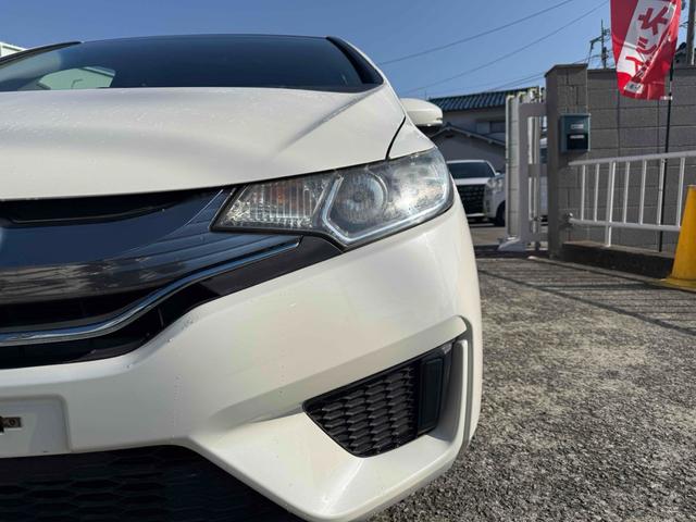 フィットハイブリッド Ｌパッケージ　ハイブリッド　ＥＴＣ　バックカメラ　ナビ　ＴＶ　オートクルーズコントロール　オートライト　スマートキー　電動格納ミラー　ＡＴ　ＣＤ　ＵＳＢ　ＥＳＣ　エアコン　パワーステアリング　パワーウィンドウ（8枚目）