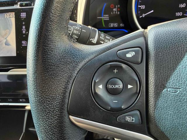 フィットハイブリッド Ｌパッケージ　ハイブリッド　ＥＴＣ　バックカメラ　ナビ　ＴＶ　オートクルーズコントロール　オートライト　スマートキー　電動格納ミラー　ＡＴ　ＣＤ　ＵＳＢ　ＥＳＣ　エアコン　パワーステアリング　パワーウィンドウ（20枚目）