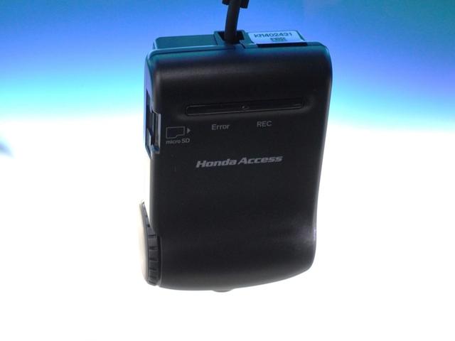 フリード Ｇプレミアムエディション　１年保証ナビ後席モニタＤレコＲカメＥＴＣ両電扉　地デジＴＶ　盗難防止　ＶＳＡ　Ｂカメラ　ウォークスルー　キーレスキー　パワステ　ＡＡＣ　ＥＴＣ車載器　３列シート　パワーウィンド　ＡＢＳ　Ｗエアバック（5枚目）