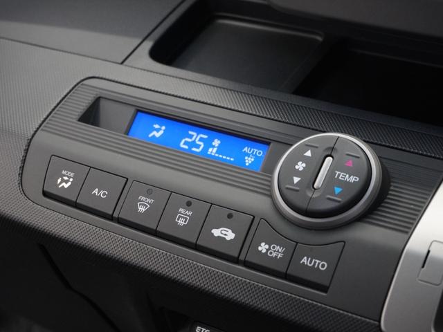 フリード Ｇプレミアムエディション　１年保証ナビ後席モニタＤレコＲカメＥＴＣ両電扉　地デジＴＶ　盗難防止　ＶＳＡ　Ｂカメラ　ウォークスルー　キーレスキー　パワステ　ＡＡＣ　ＥＴＣ車載器　３列シート　パワーウィンド　ＡＢＳ　Ｗエアバック（12枚目）