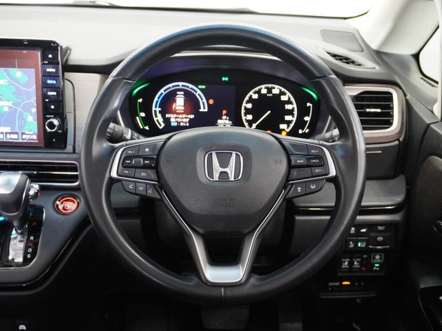 オデッセイハイブリッド ｅ：ＨＥＶアブソルート・ＥＸ　１年保証ナビ全周囲カメＤレコＥＴＣ両電扉ＢＴ　ＬＥＤライト　シ－トヒ－タ－　両側ＰＳＤ　パワ－シ－ト　Ｐアシスト　フルセグ　アイドルストップ　クルーズコントロール　ＤＶＤ再生機能　３列シート　キーレス（11枚目）