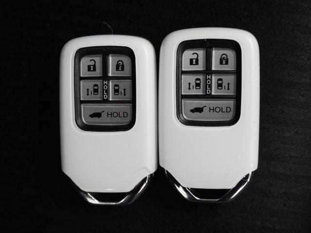 オデッセイハイブリッド ｅ：ＨＥＶアブソルート・ＥＸ　１年保証ナビ全周囲カメＤレコＥＴＣ両電扉ＢＴ　ＬＥＤライト　シ－トヒ－タ－　両側ＰＳＤ　パワ－シ－ト　Ｐアシスト　フルセグ　アイドルストップ　クルーズコントロール　ＤＶＤ再生機能　３列シート　キーレス（21枚目）