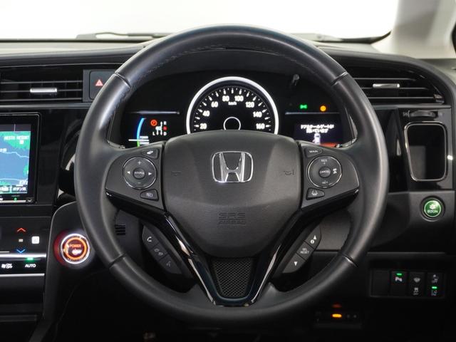 シャトル ハイブリッドＺホンダセンシング　２年保証ナビＲカメＥＴＣクルコンＢＴ地デジＬＥＤ　衝突軽減　カーテンエアバック　ＬＥＤライト　前席シートヒーター　イモビ　Ｂカメラ　ＵＳＢ接続　ＤＶＤ　パワーウィンドウ　ナビＴＶ　スマートキー　禁煙車（7枚目）