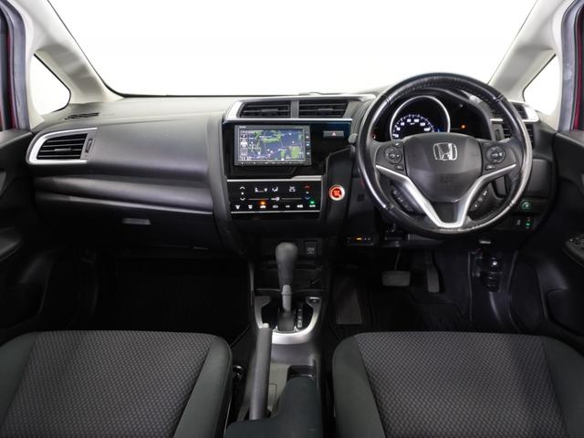 フィット １３Ｇ・Ｌホンダセンシング　１年保証　ＬＥＤヘッドライト　フォグライト　ＦＬパッケージ　オートライト　オートリトラミラー　ラゲッジルームランプ　シートバックポケット（助手席）　アームレスト付センターコンソールＢＯＸ　ドラレコ（9枚目）