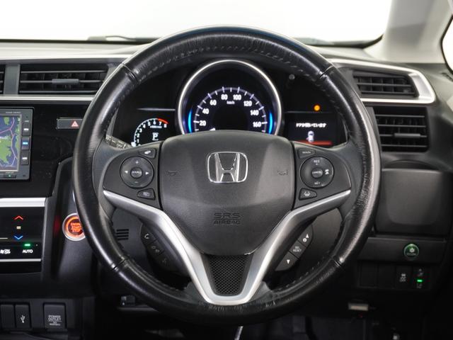 フィット １３Ｇ・Ｌホンダセンシング　１年保証　ＬＥＤヘッドライト　フォグライト　ＦＬパッケージ　オートライト　オートリトラミラー　ラゲッジルームランプ　シートバックポケット（助手席）　アームレスト付センターコンソールＢＯＸ　ドラレコ（10枚目）