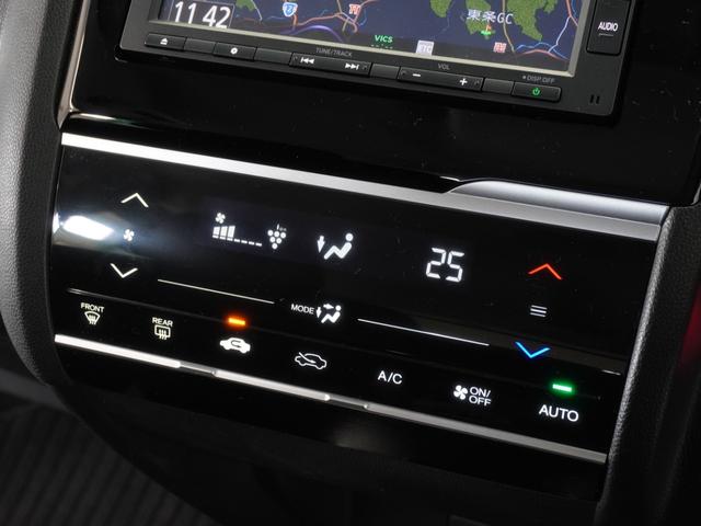フィット １３Ｇ・Ｌホンダセンシング　１年保証　ＬＥＤヘッドライト　フォグライト　ＦＬパッケージ　オートライト　オートリトラミラー　ラゲッジルームランプ　シートバックポケット（助手席）　アームレスト付センターコンソールＢＯＸ　ドラレコ（12枚目）