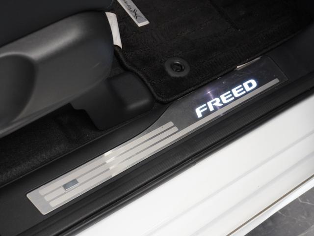 フリードハイブリッド ハイブリッド・モデューロXホンダセンシング 1年保証 フルセグRカメラLEDヘッドライト+アクティブコーナリングライト リア左右パワースライドドア センターテーブル オートリトラミラーCパッケージ ModuloX専用装備 前後ドラレコ15AW(23枚目)