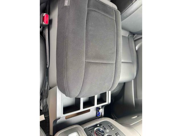 NV350キャラバンバン ロングライダープレミアムGXターボ 4WD ディーゼルターボ ETC2.0/パイオニア製ナビ/バックカメラ/カレディステアリングハンドル/社外ビルシュタインショックアブソーバー/リアベッドキッド車中泊仕様(19枚目)