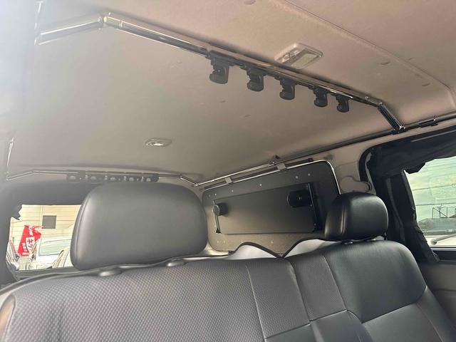 NV350キャラバンバン ロングライダープレミアムGXターボ 4WD ディーゼルターボ ETC2.0/パイオニア製ナビ/バックカメラ/カレディステアリングハンドル/社外ビルシュタインショックアブソーバー/リアベッドキッド車中泊仕様(25枚目)