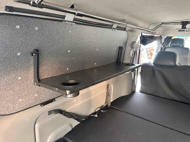 NV350キャラバンバン ロングライダープレミアムGXターボ 4WD ディーゼルターボ ETC2.0/パイオニア製ナビ/バックカメラ/カレディステアリングハンドル/社外ビルシュタインショックアブソーバー/リアベッドキッド車中泊仕様(33枚目)