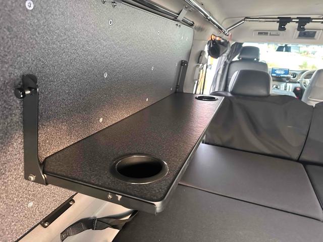 NV350キャラバンバン ロングライダープレミアムGXターボ 4WD ディーゼルターボ ETC2.0/パイオニア製ナビ/バックカメラ/カレディステアリングハンドル/社外ビルシュタインショックアブソーバー/リアベッドキッド車中泊仕様(34枚目)