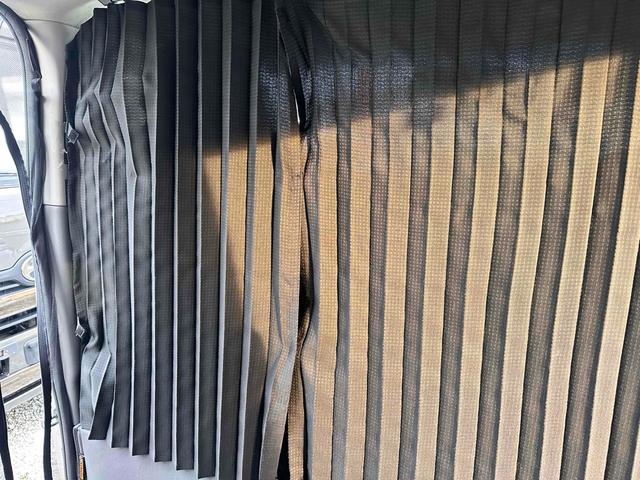 NV350キャラバンバン ロングライダープレミアムGXターボ 4WD ディーゼルターボ ETC2.0/パイオニア製ナビ/バックカメラ/カレディステアリングハンドル/社外ビルシュタインショックアブソーバー/リアベッドキッド車中泊仕様(46枚目)