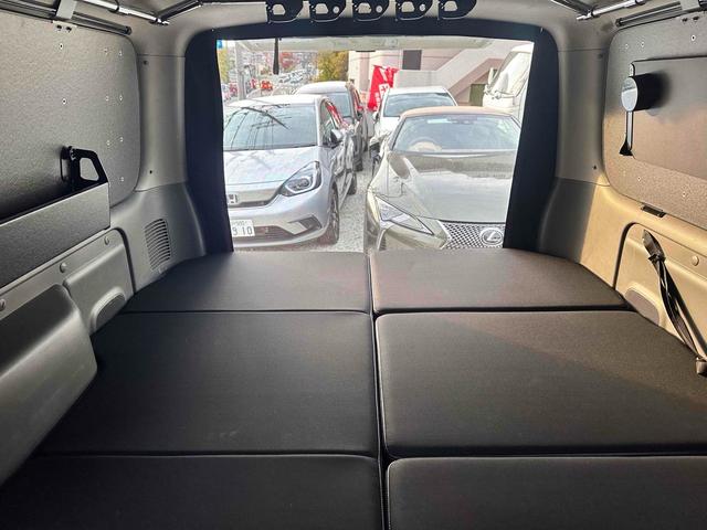 NV350キャラバンバン ロングライダープレミアムGXターボ 4WD ディーゼルターボ ETC2.0/パイオニア製ナビ/バックカメラ/カレディステアリングハンドル/社外ビルシュタインショックアブソーバー/リアベッドキッド車中泊仕様(48枚目)