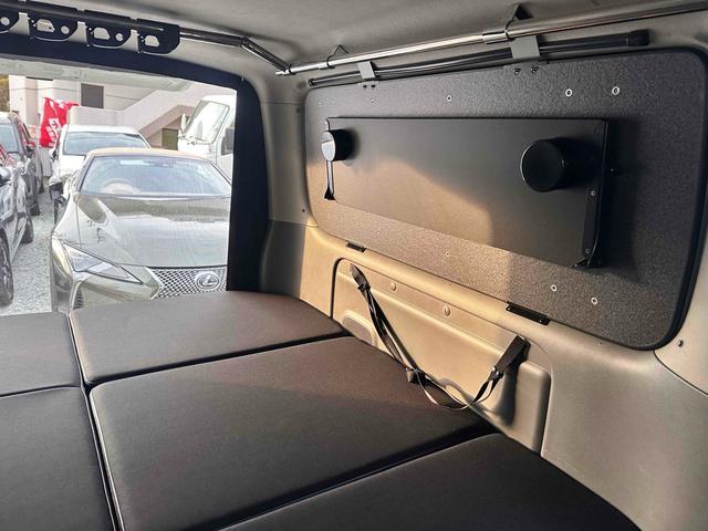 NV350キャラバンバン ロングライダープレミアムGXターボ 4WD ディーゼルターボ ETC2.0/パイオニア製ナビ/バックカメラ/カレディステアリングハンドル/社外ビルシュタインショックアブソーバー/リアベッドキッド車中泊仕様(49枚目)