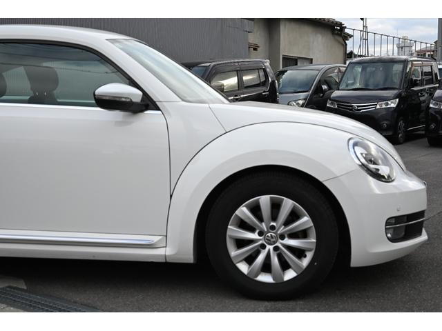 ザ・ビートル デザイン フルセグTV ナビ Bluetooth接続 前後パークセンサー HIDヘッドライト キーレス鍵2個 ETC 禁煙車 クリアランスソナー ターボ 純正アルミホイール 盗難防止装置 障害物センサー(18枚目)